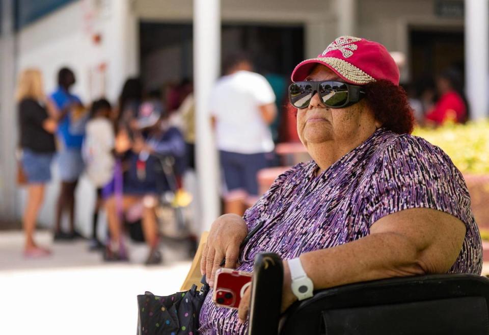 Lorna Weir poses for a portrait outside Annie L. Weaver Health Center in Pompano Beach, Fla., on Thursday, July 20, 2023. Weir tried to sign up for LIHEAP, a light bill assistance program, but was missing some information necessary to sign up.