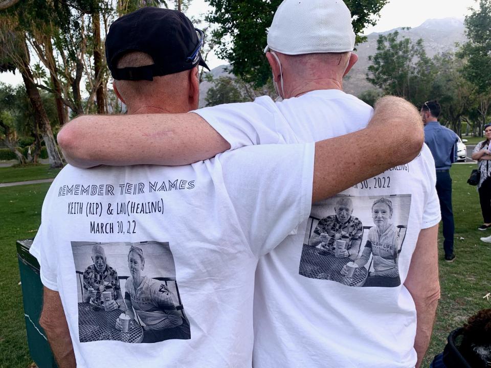 From left, Palm Springs Director of Planning Services Flinn Fagg and John Siegel embrace at the Ride of Silence event in Palm Springs, Calif., on May 18, 2022.
