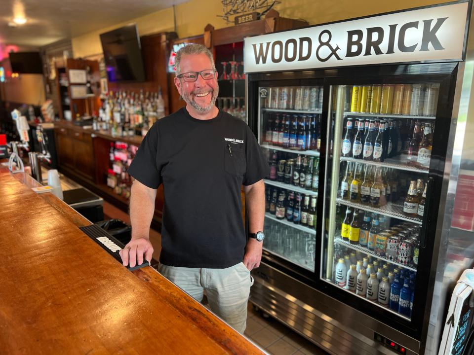 Wood & Brick Tavern owner Jeff Lindquist stands inside his business Tuesday, July 11, 2023, in Rockford