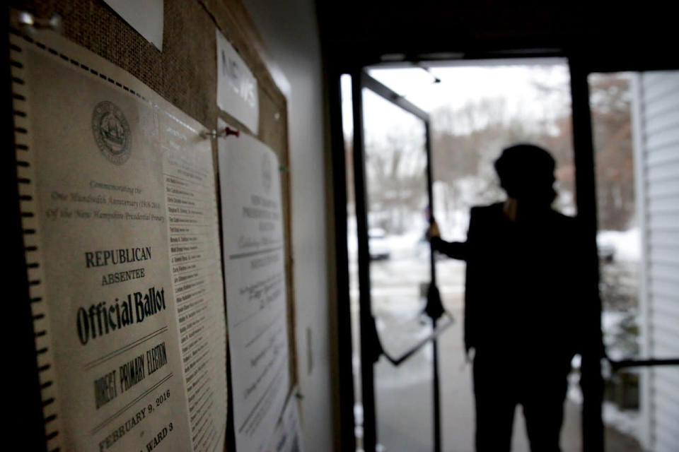 A voter enters a polling site in Nashua