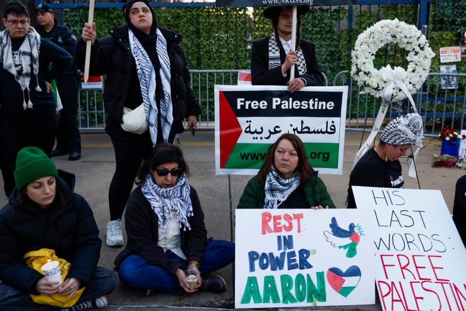 People participate in a vigil for U.S. Air Force active-duty airman Aaron Bushnell outside the Israeli Embassy on February 26, 2024 in Washington, DC. Bushnell died after setting himself on fire while live streaming, according to published reports, in front of the Israeli Embassy in protest over the Gaza war. (Getty Images)