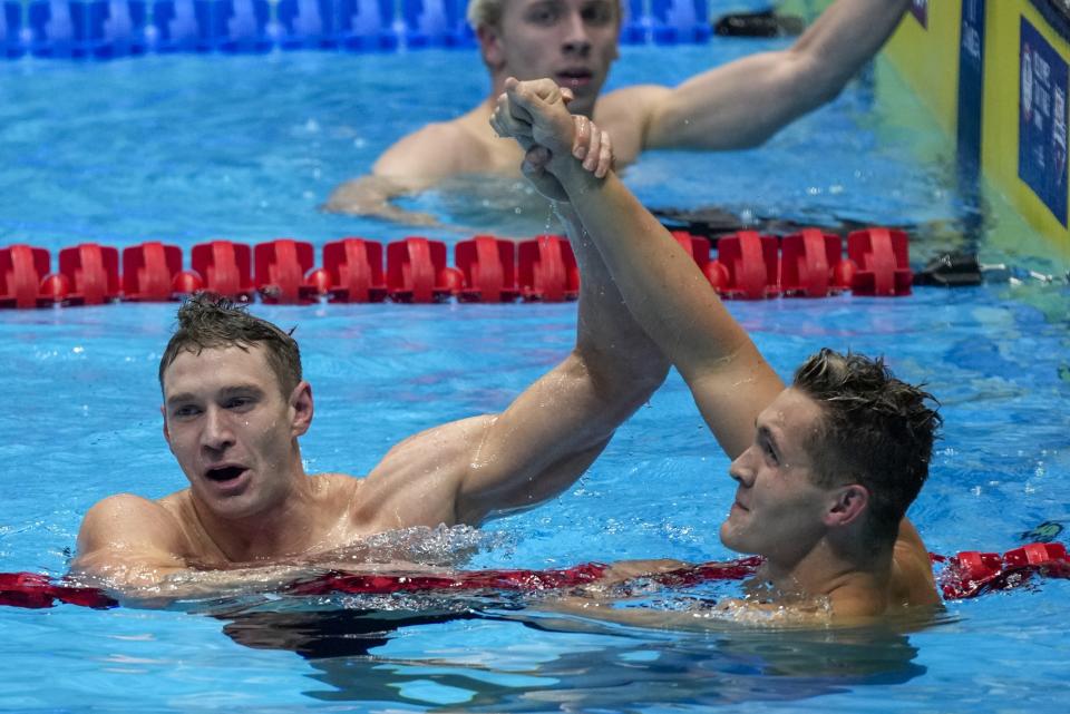 Keaton Jones and Ryan Murphy celebrate after the Men's 200 backstroke finals Thursday, June 20, 2024, at the US Swimming Olympic Trials in Indianapolis. (AP Photo/Michael Conroy)