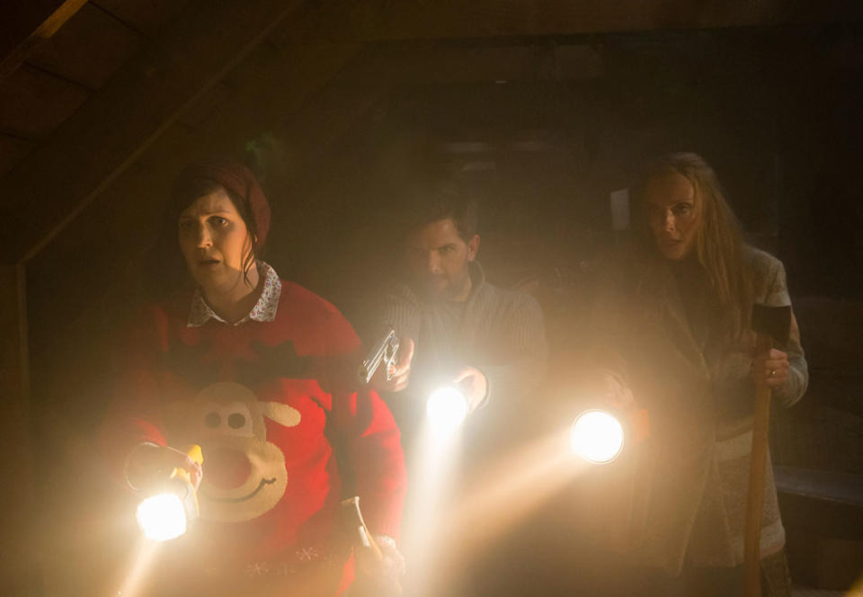 KRAMPUS, l-r: Allison Tolman, Adam Scott, Toni Collette, 2015. ph: Steve Unwin/&#xc2;&#xa9;Universal Pictures/courtesy Everett Collection