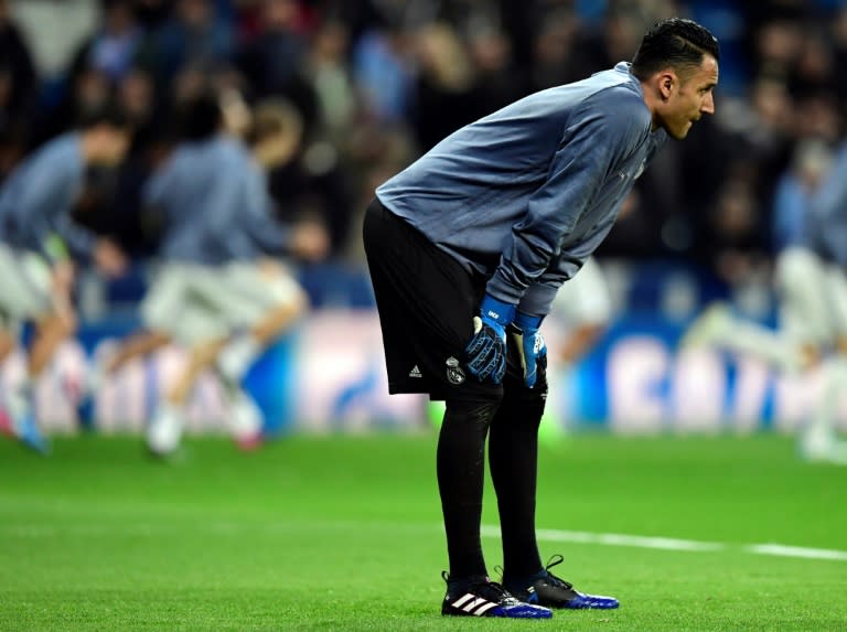 Real Madrid's goalkeeper Keylor Navas warms up ahead of an UEFA Champions League match in Madrid, on February 15, 2017