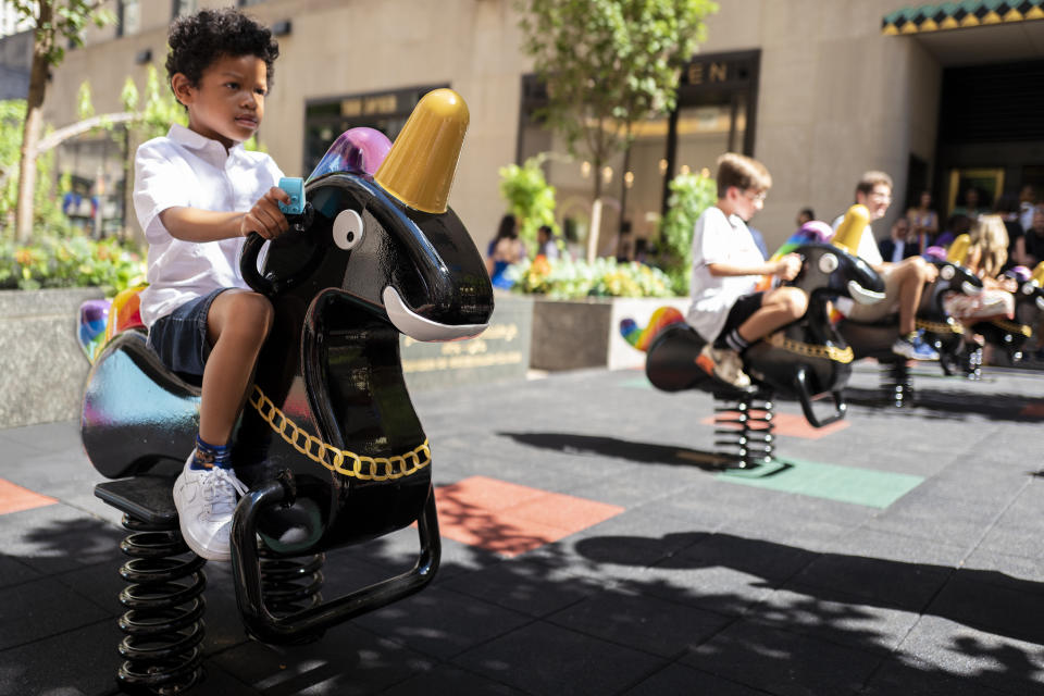 “Funtime Unicorns,” installed at Rockefeller Center in collaboration with Art Production Fund. - Credit: Photo by Emil Horowitz / courtesy of Derrick Adams Edition & Art Production Fund