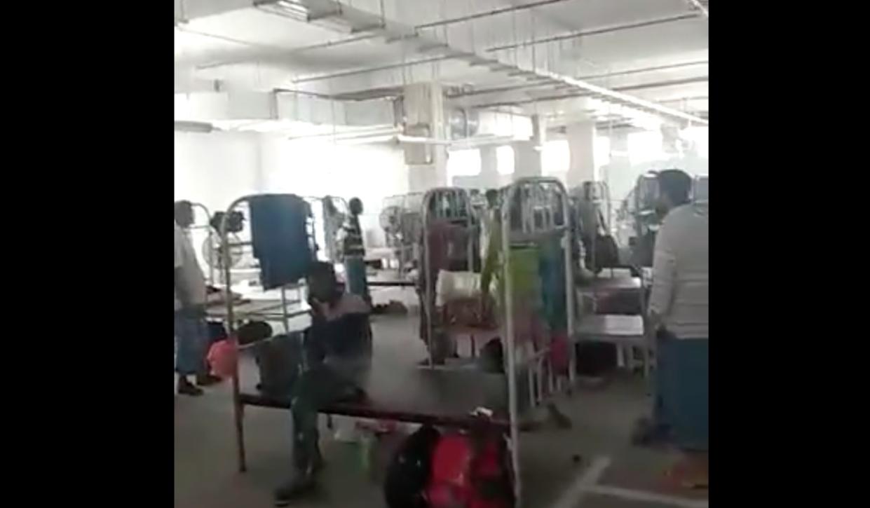 Foreign workers being housed in multi-storey car parks in Singapore. (PHOTO: Screengrab from video/Facebook)