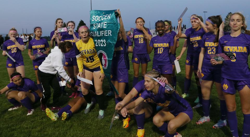 The Nevada girls soccer team celebrates after winning 1-0 over Center Point-Urbana during the Class 1A girls soccer regional final at Cub Stadium Thursday, May 25, 2023, in Nevada, Iowa. The Cubs are headed to state for the 11th year in a row.