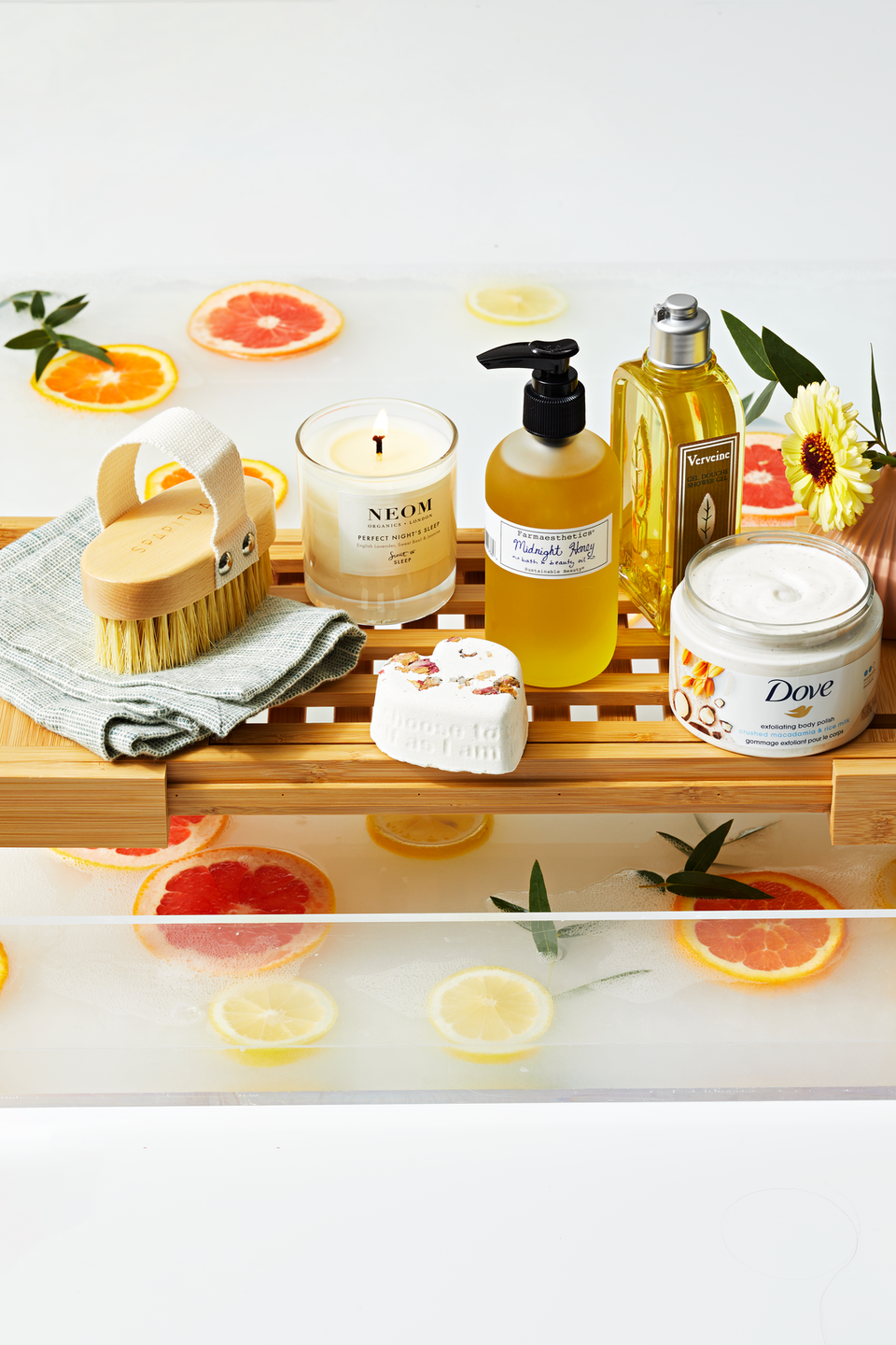 a table with bath products on it for a spa day