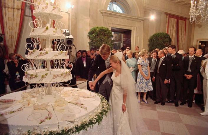<p>The couple famously had a six-tier wedding cake. Per the Nixon Library, "Standing 6’10” tall and consisting of six layers, including a 64” diameter base layer, it took White House Pastry Chef Heinz Bender several days to bake and decorate." The White House <a href="https://catalog.archives.gov/id/6728182" rel="nofollow noopener" target="_blank" data-ylk="slk:released the recipe in a press release" class="link ">released the recipe in a press release</a>.</p>