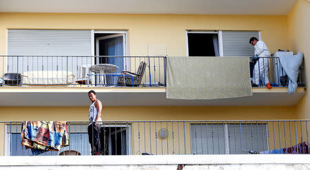 Police photographes a flat where the 27-year-old Syrian suspect lived, after an explosion in Ansbach near Nuremberg, Germany, July 25, 2016. REUTERS/Michaela Rehle/File Photo