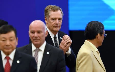 U.S. Trade Representative Robert Lighthizer (C) walks in a meeting room to attend the APEC trade ministers' meeting at the National Convention Center in Hanoi May 20, 2017. REUTERS/Hoang Dinh Nam/Pool