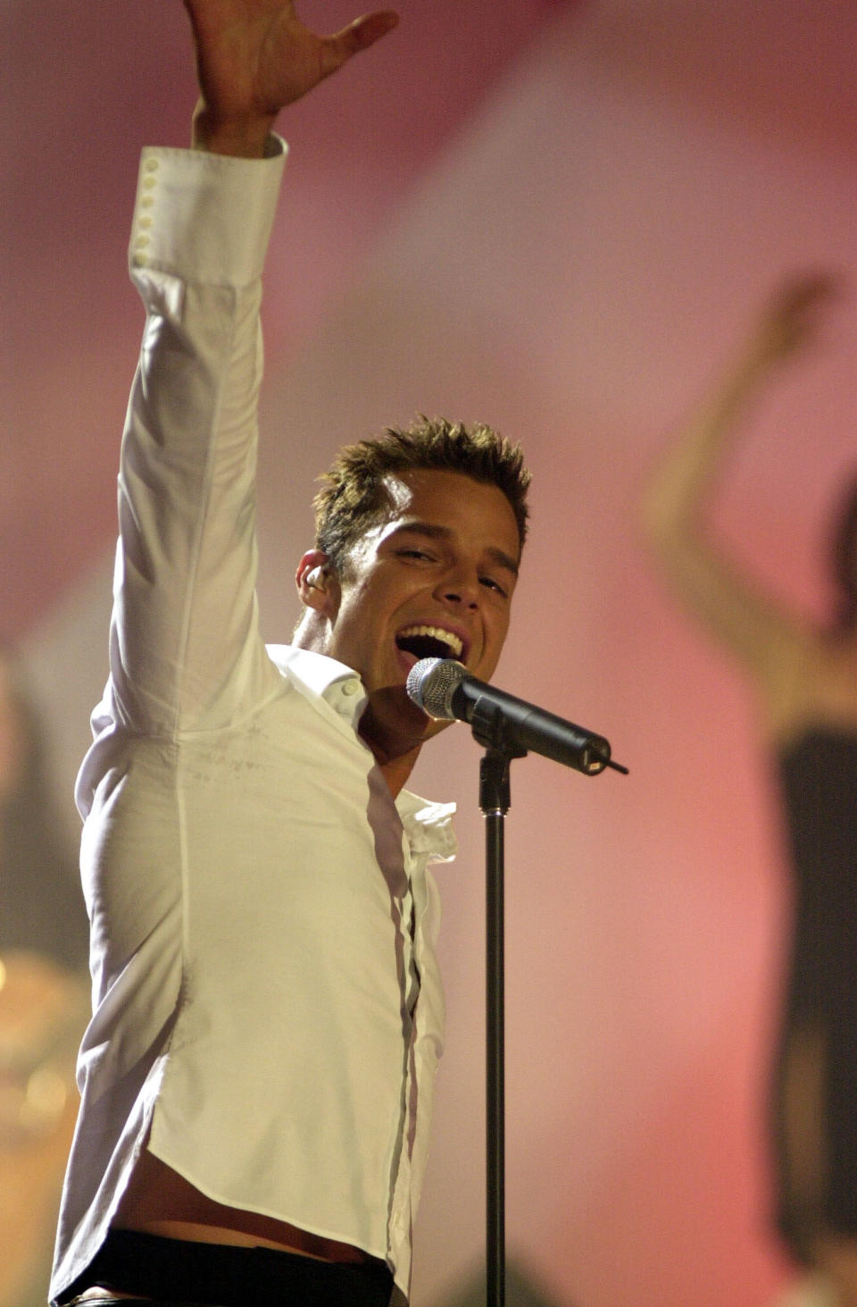 Latin pop singer Ricky Martin performing on stage at the Brit Awards 2000 ceremony, held at Earls Court in west London.