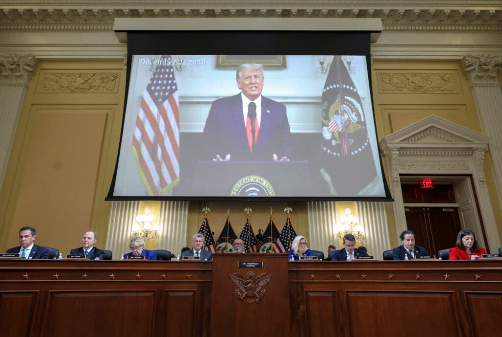 A video of then-President Donald Trump speaking is displayed as the House select committee investigating the Jan. 6 attack on the U.S. Capitol holds a hearing on Capitol Hill in Washington, Thursday, Oct. 13, 2022. (Alex Wong/Pool Photo via AP)