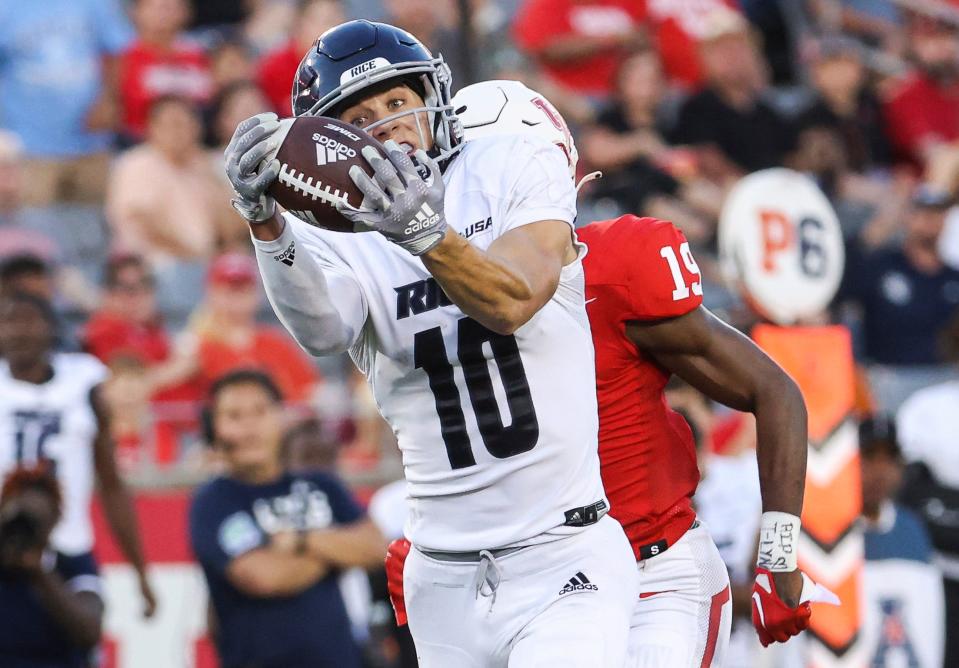 Rice wide receiver Luke McCaffrey catches a touchdown pass against Houston.