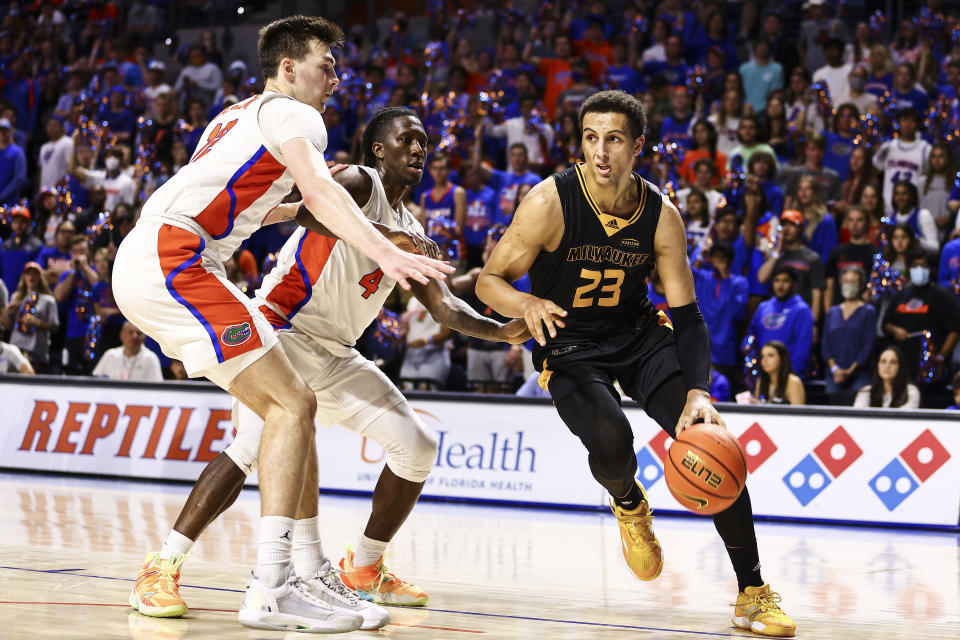 Milwaukee's Patrick Baldwin Jr. drives to the basket against Florida during a game on Nov. 18, 2021. (James Gilbert/Getty Images)