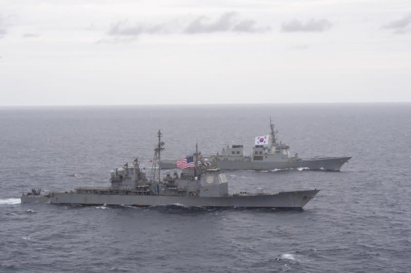 The USS Robert Smalls cruiser and ROKS Yulgok Yi I destroyer take part in a joint naval drill Monday. The three-day exercise comes in response to growing North Korean threats including a new submarine that may be capable of launching nuclear missiles. Photo courtesy of Republic of Korea Navy