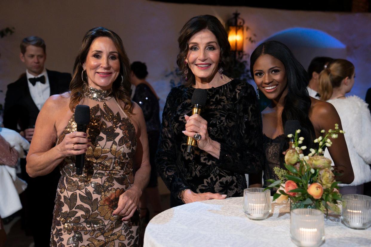 Kathy Swarts (center) co-hosted the gold carpet with "The Bachelorette" season 20 star Charity Lawson (right) and interviewed fellow "Golden Bachelor" castmate Faith Martin ahead of the Golden Wedding between Gerry Turner and Theresa Nist in Palm, Springs, California, on Jan. 4, 2024.