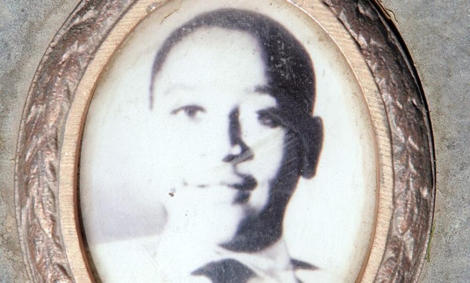 This 2005 photo shows a picture of Emmett Till included on the plaque on his gravesite at Burr Oak Cemetery in Aslip, Illinois. His unsolved 1955 murder in Money, Mississippi, after accusations of whistling at a white woman helped spark the civil rights movement. The woman, Carolyn Donham, admitted later she’d lied. (Photo by Scott Olson/Getty Images)