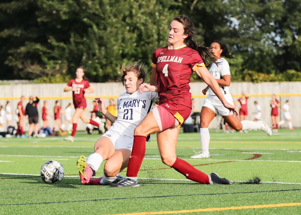 Cardinal Spellman's Isabella McDonough battles for possession with St. Mary's Cameryn Dunn during a game against St. Mary's on Wednesday, Sept. 27, 2023.