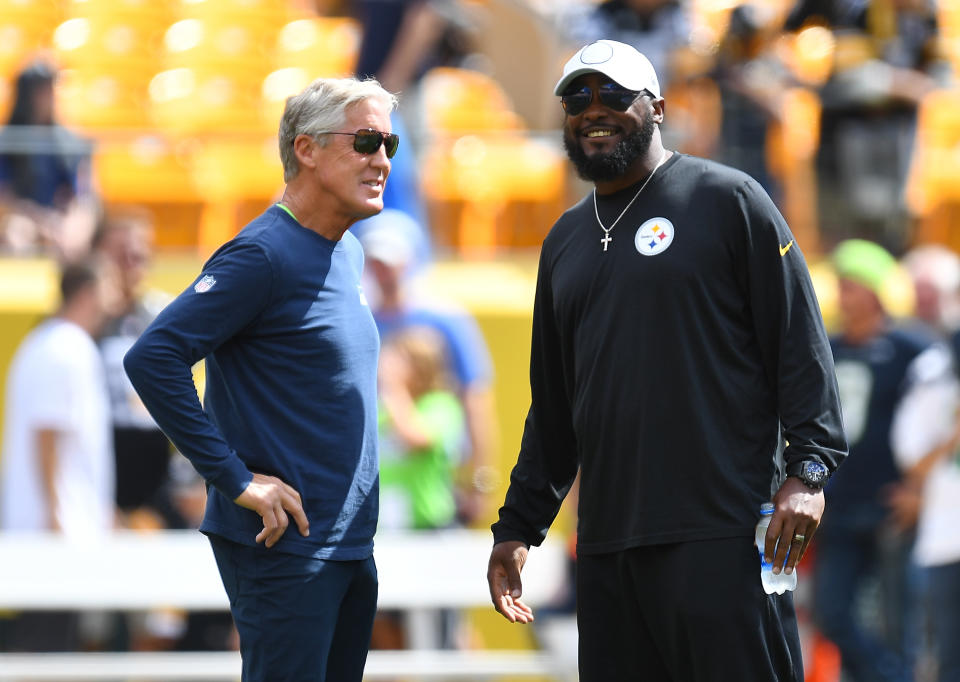 Seattle's Pete Carroll (left) and Pittsburgh's Mike Tomlin have done two of the best NFL coaching jobs this season. (Photo by Joe Sargent/Getty Images)