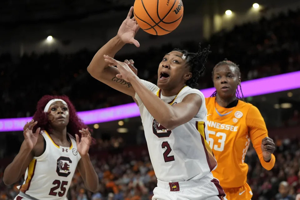 South Carolina forward Ashlyn Watkins vies for the ball with Tennessee forward Jillian Hollingshead during the first half of an NCAA college basketball game at the Southeastern Conference women's tournament Saturday, March 9, 2024, in Greenville, S.C. (AP Photo/Chris Carlson)