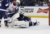 May 6, 2015; Tampa, FL, USA; Tampa Bay Lightning goalie Ben Bishop (30) makes a save against the Montreal Canadiens during the third period of game three of the second round of the 2015 Stanley Cup Playoffs at Amalie Arena. Tampa Bay Lightning defeated the Montreal Canadiens 2-1. Mandatory Credit: Kim Klement-USA TODAY Sports