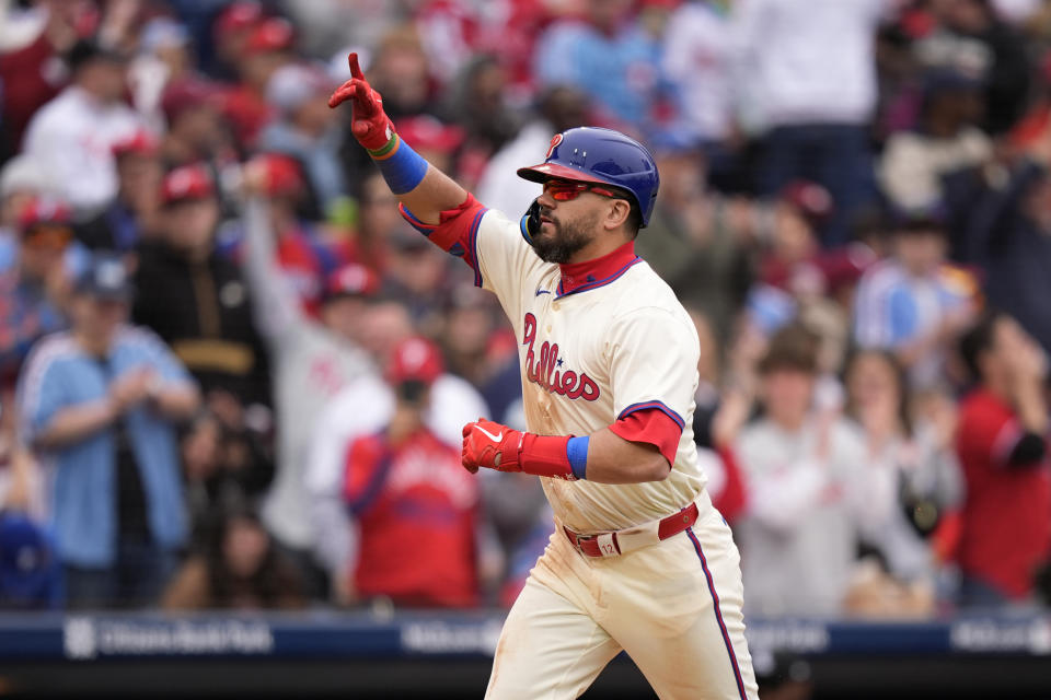 Philadelphia Phillies' Kyle Schwarber reacts after hitting a home run against Chicago White Sox pitcher Deivi Garcia during the sixth inning of a baseball game, Sunday, April 21, 2024, in Philadelphia. (AP Photo/Matt Slocum)