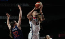 United States' Brittney Griner (15) drives to the basket ahead of Serbia's Angela Dugalic (32) during women's basketball semifinal game at the 2020 Summer Olympics, Friday, Aug. 6, 2021, in Saitama, Japan. (AP Photo/Eric Gay)
