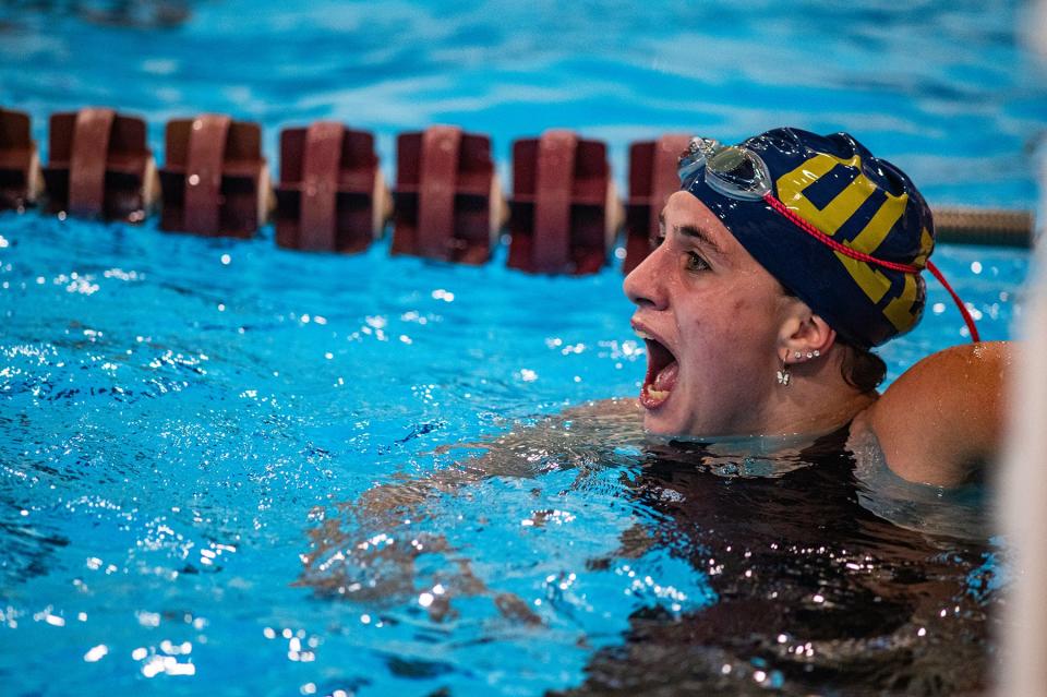 Lourdes' Alaina Kozak reacts to her first place finish in the 500 meter freestyle during the Kingston and Our Lady of Lourdes girls swim meet at Kingston High School in Kingston, NY on Tuesday, October 10, 2023. KELLY MARSH/FOR THE POUGHKEEPSIE JOURNAL