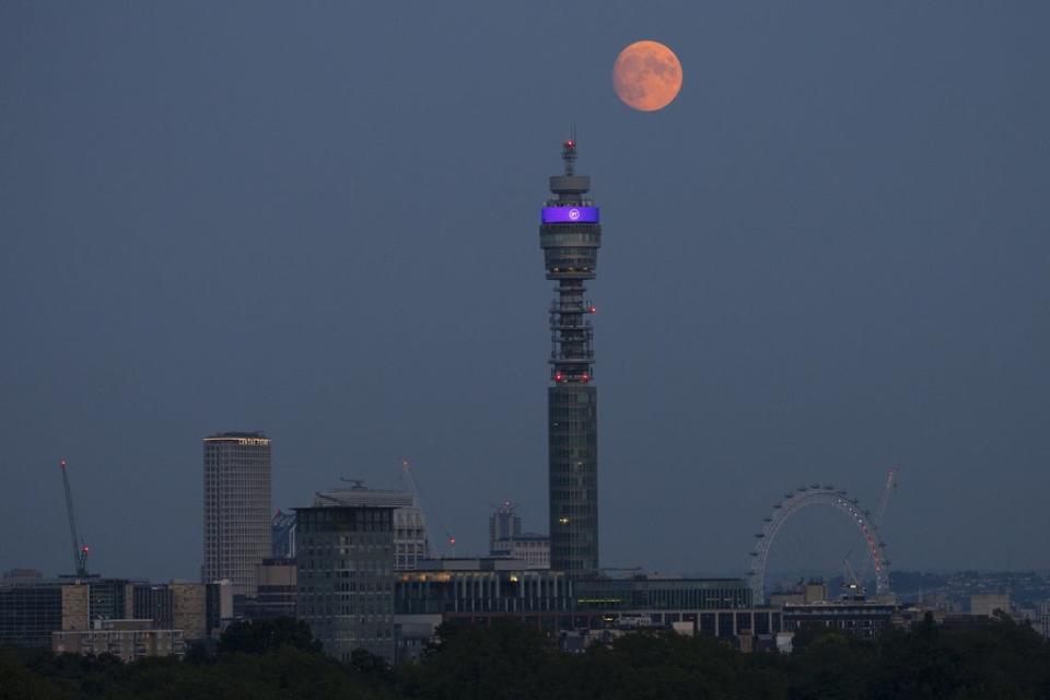 The moon rises over the BT Tower in central London (Hollie Adams/PA) (PA Wire)