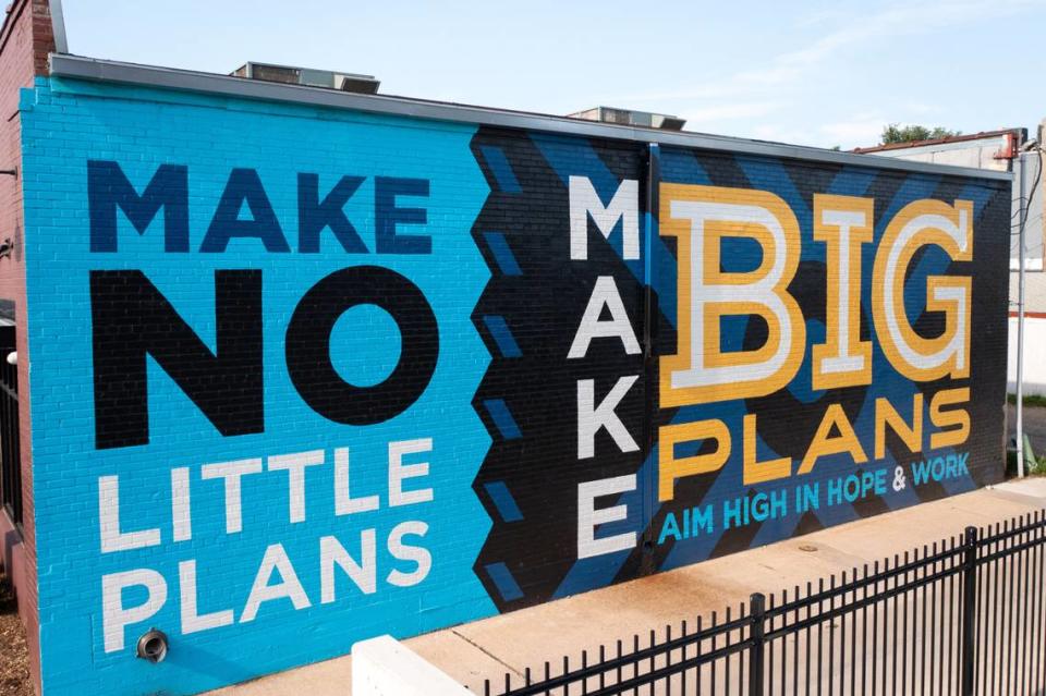 Ben Hutton, who thinks the downtown library could be a great new home for the Wichita Art Museum, has this mural at his construction company office in Delano. “Just personally, I love to dream about the future of this city and how we can make it amazing,” he said.