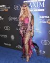 <p>Former Danity Kane singer <strong>AUBREY O'DEY</strong> arrived at the Maxim Halloween party as A Nightmare You Had After Having Hypnotiq And Skittles For Dinner. </p>