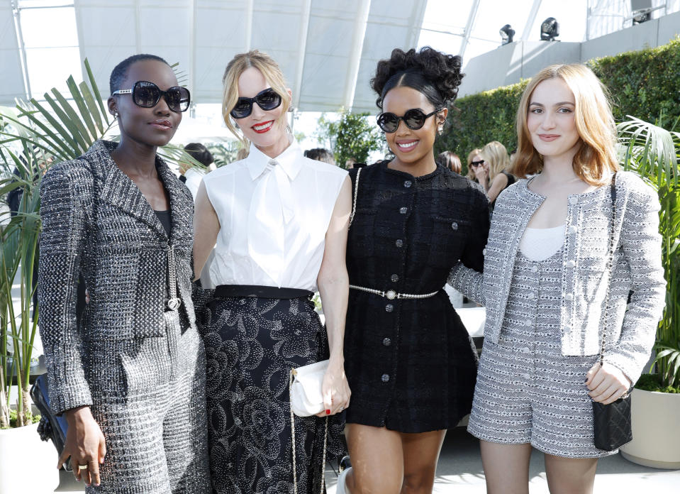 LOS ANGELES, CALIFORNIA - NOVEMBER 09: Lupita Nyong’o, Leslie Mann, H.E.R., and Maude Apatow, all wearing CHANEL attend the Academy Women's Luncheon Presented By CHANEL at the Academy Museum of Motion Pictures on November 09, 2023 in Los Angeles, California. (Photo by Stefanie Keenan/WireImage)