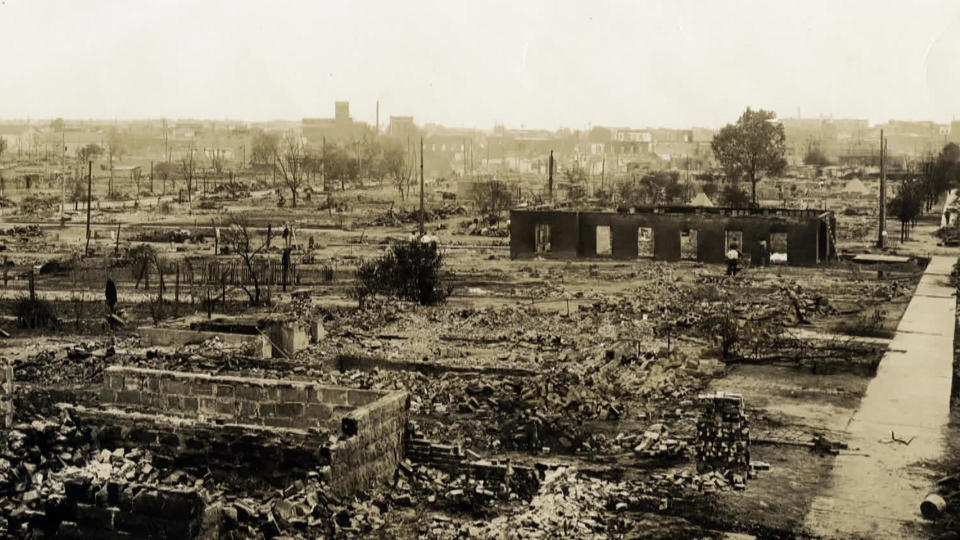 Ruins from the 1921 Tulsa Massacre, in which a prosperous Black neighborhood was burned to the ground by a White mob. Three hundred Black people were killed, and 8,000 were left homeless.  / Credit: Oklahoma Historical Society