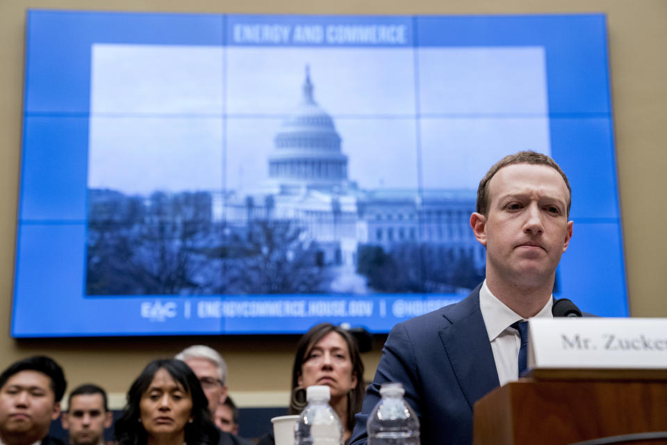 FILE - In this April 11, 2018, file photo Facebook CEO Mark Zuckerberg pauses while testifying before a House Energy and Commerce hearing on Capitol Hill in Washington. Federal regulators are fining Facebook $5 billion for privacy violations and instituting new oversight and restrictions on its business. But they are only holding Zuckerberg personally responsible in a limited fashion. (AP Photo/Andrew Harnik, File)