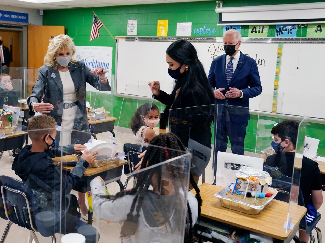 President Joe Biden, first lady Jill Biden and fifth-grade teacher Cindy Bertamini, watch a student demonstrate his project, during a visit to Yorktown Elementary School, Monday, May 3, 2021. (AP)