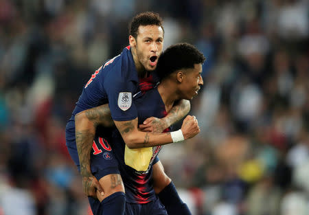 Soccer Football - Ligue 1 - Paris St Germain v AS Monaco - Parc des Princes, Paris, France - April 21, 2019 Paris St Germain's Neymar and Presnel Kimpembe celebrate after the match REUTERS/Gonzalo Fuentes