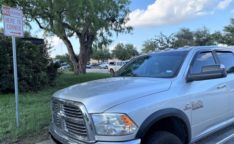 If you read the fine print, the "no parking" has one exception - the guy who parked his car there. Don't know if this softball fan was for Forsan or Stamford, but ACU police missed this call.