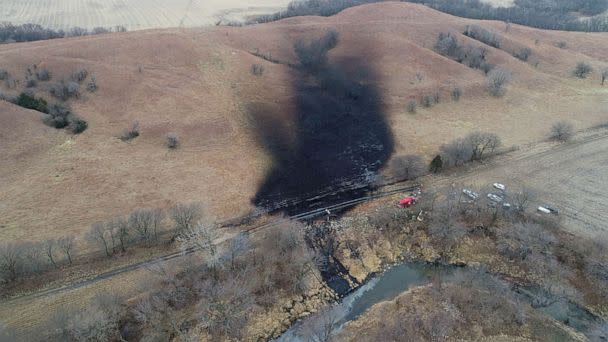 PHOTO: Emergency crews work to clean up the largest U.S. crude oil spill in nearly a decade, following the leak at the Keystone pipeline operated by TC Energy in rural Washington County, Kansas, Dec. 9, 2022. (Drone Base/Reuters)