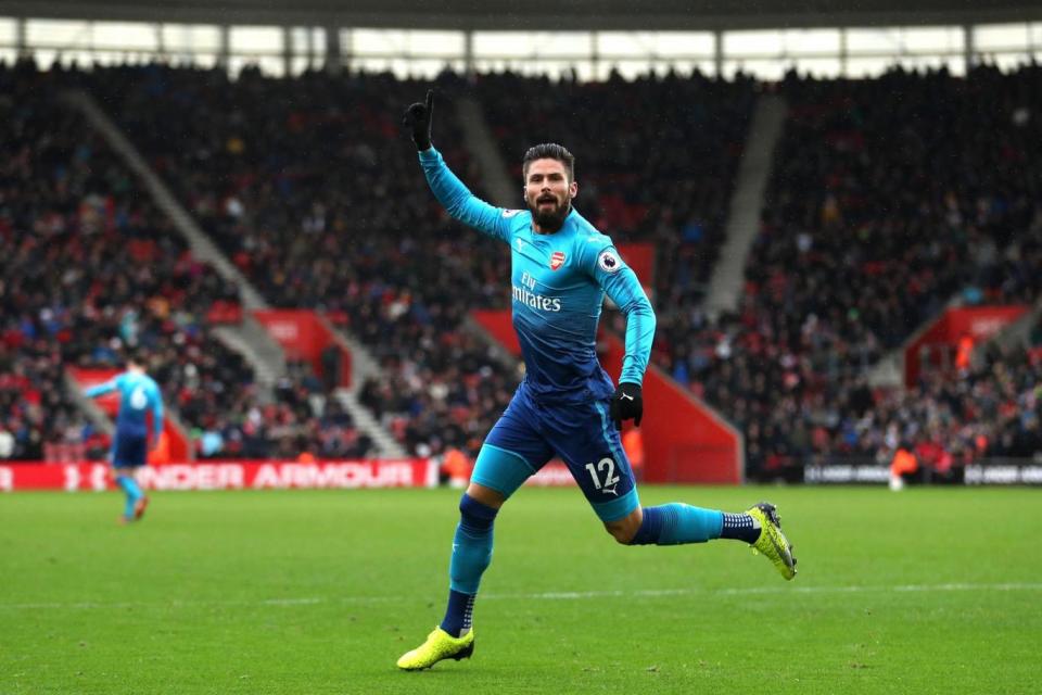 On target: Giroud came off the bench to rescue Arsenal on Sunday (Getty Images)