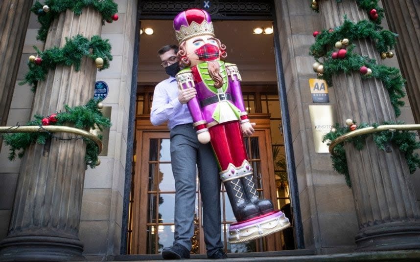 Christmas is back on: Preparations at the Kimpton Blythswood Square Hotel in Glasgow   - Jane Barlow /PA