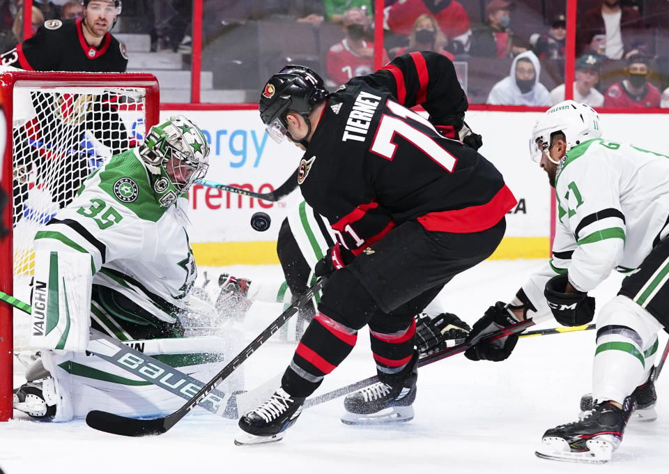 Ottawa Senators' Chris Tierney (71) shoots against Dallas Stars' Anton Khudobin (35) during second-period NHL hockey game action in Ottawa, Ontario, Sunday, Oct. 17, 2021. (Sean Kilpatrick/The Canadian Press via AP)