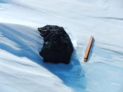 An 18kg meteorite found by the Belgo-Japanese SAMBA meteorite team during a field trip on the Nansen Ice Field, 140km south of Princess Elisabeth Antarctica, during the BELARE 2012-2013 expedition. (Photo courtesy of International Polar Foundation/Vinciane Debaille) <br> <br> <a href="http://www.livescience.com/27550-big-meteorite-found-antarctica.html" rel="nofollow noopener" target="_blank" data-ylk="slk:Click here to see the full collection at LiveScience.com;elm:context_link;itc:0;sec:content-canvas" class="link ">Click here to see the full collection at LiveScience.com</a>