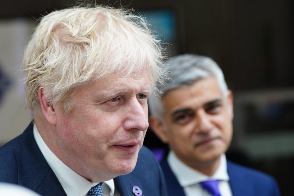 Prime Minister Boris Johnson (left) and Mayor of London Sadiq Khan at Paddington station in London, to mark the completion of London’s Crossrail project (PA) (PA Wire)