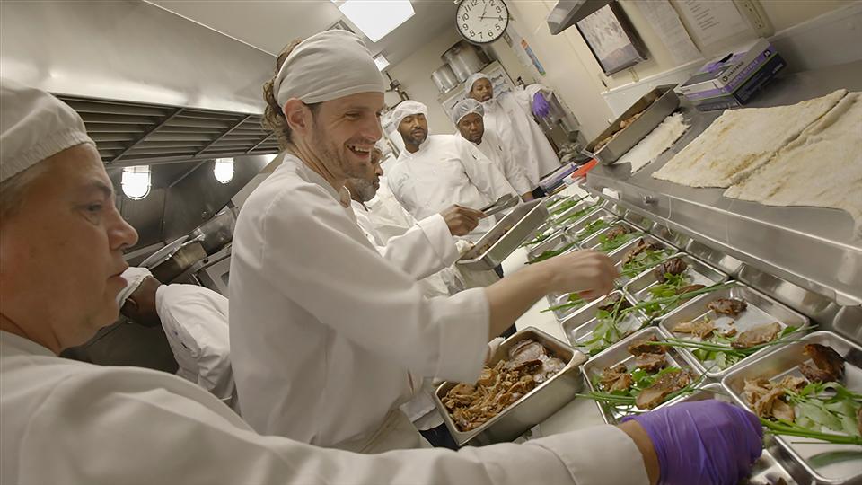 Brad Leonard prepares a multicourse meal at Lakeland Correctional Facility in Coldwater, Michigan. Leonard is a student in the food tech program, a unique culinary class designed to teach the intricacies of fine dining cuisine. The program is the subject of the documentary "Coldwater Kitchen," which will have its Michigan premiere at the 2023 Freep Film Festival.