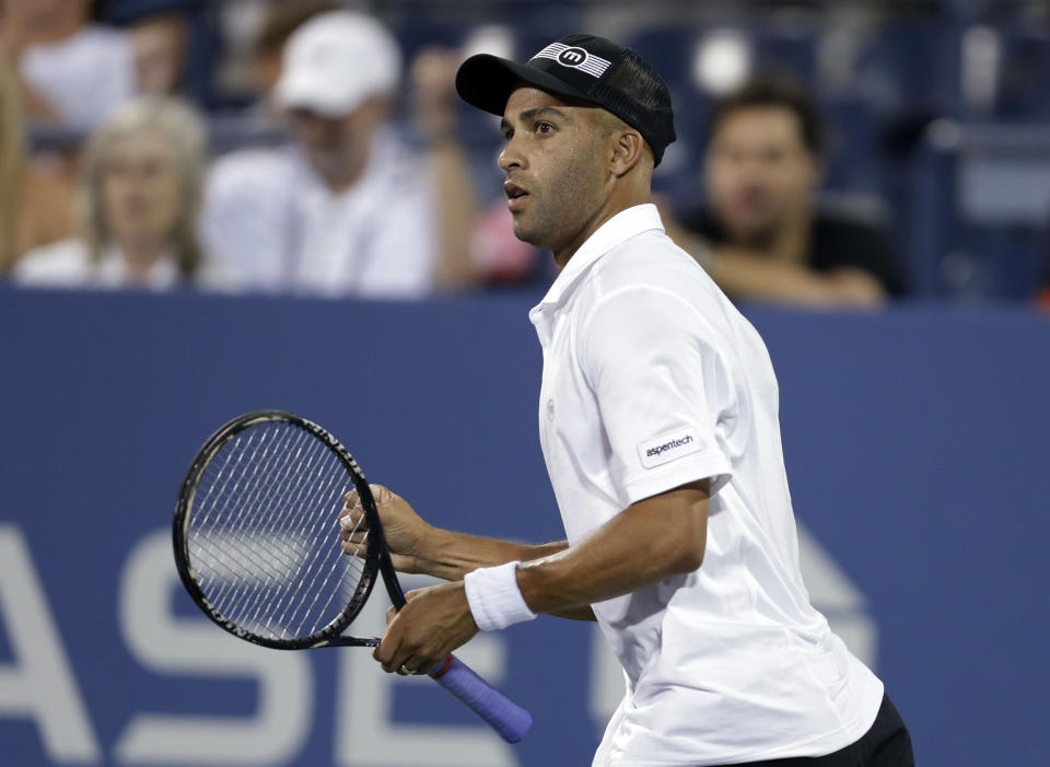 FILE - In this Aug. 28, 2013 file photo, James Blake reacts during a first round match against Ivo Karlovic, of Croatia, at the U.S. Open tennis tournament in New York. Officials say firefighters have found three bodies in a burning mansion owned by a Blake in Tampa. Hillsborough County Sheriff’s Spokeswoman Cristal Bermudez Nunez says the home is owned by James Blake, once ranked fourth in the world. She says neighbors have told detectives that Blake hasn’t lived in the house for a while and was renting it out. She also says detectives haven’t talked with Blake yet. Blake’s agent, Carlos Fleming, says the former tennis player is not in Florida. Authorities say the fire was reported to them at 6 a.m. Firefighters were still on the scene midmorning Wednesday, May 7, 2014.(AP Photo/Darron Cummings)