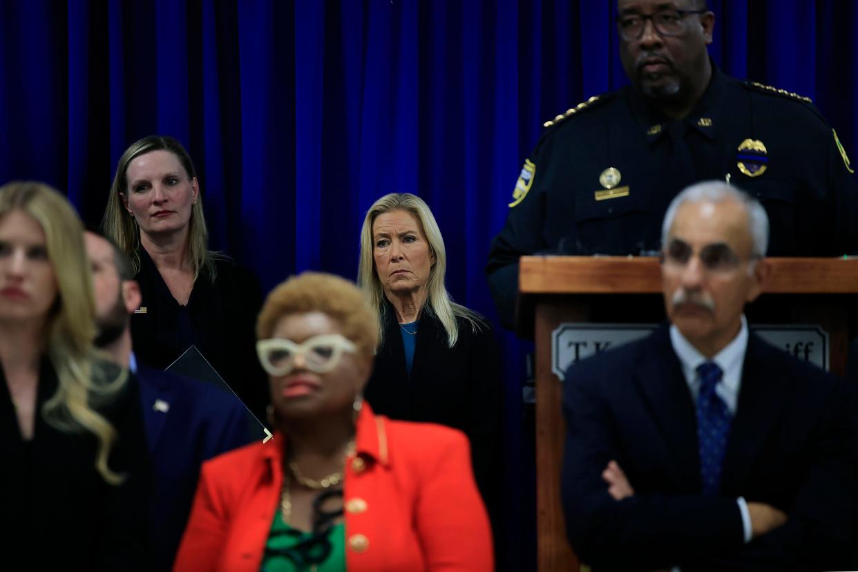 Jacksonville Mayor-elect Donna Deegan listens May 24 at the Fraternal Order of Police lodge in Jacksonville as Sheriff T.K. Waters speaks at a news conference about recent incidents of retaliation against with law enforcement members.