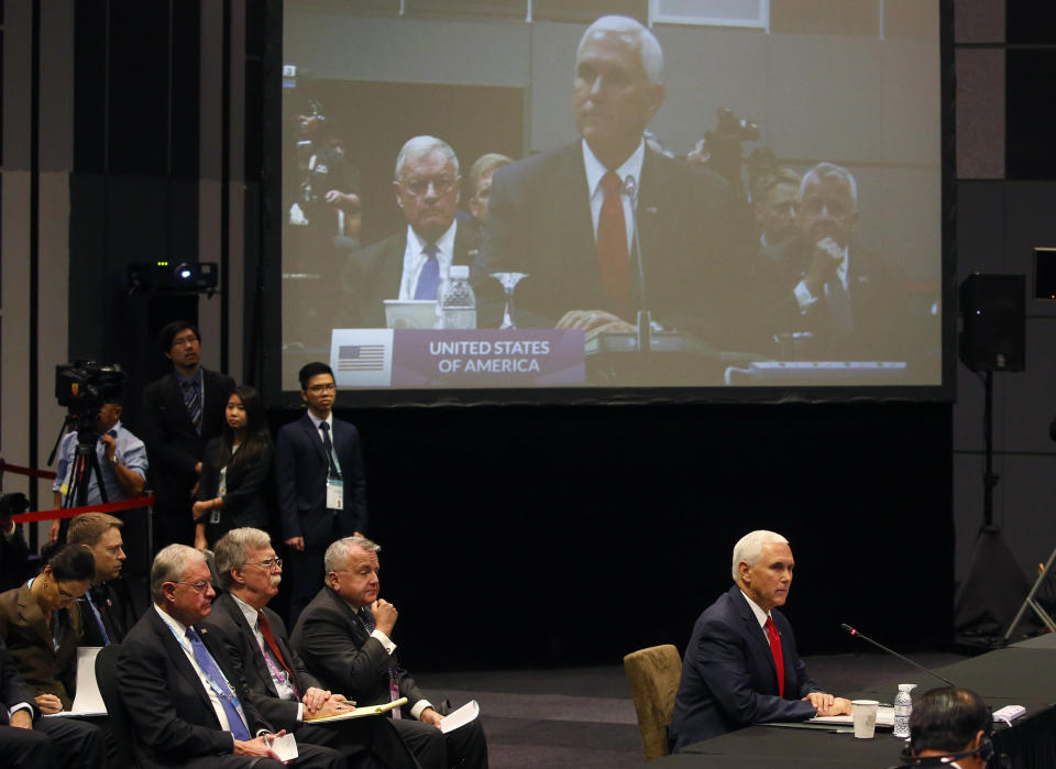 U.S. Vice President Mike Pence delivers his opening statement at the start of the ASEAN-US Summit in the ongoing 33rd ASEAN Summit and Related Summits Thursday, Nov. 15, 2018, in Singapore. (AP Photo/Bullit Marquez)
