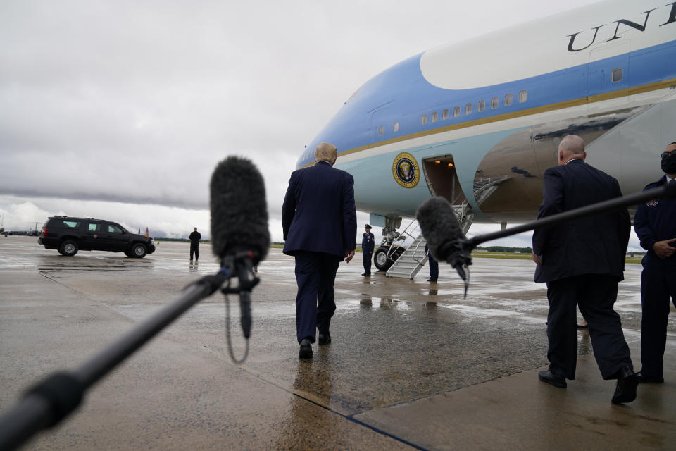 FILE - In this Sept. 10, 2020, file photo President Donald Trump boards Air Force One for a trip to a campaign rally in Freeland, Mich., in Andrews Air Force Base, Md. (AP Photo/Evan Vucci, File)