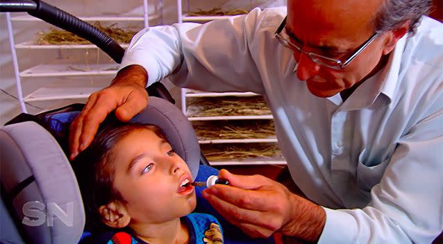 Deregistered doctor Andrew Katelaris give Chase a dose of cannabis oil.